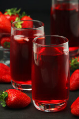 Glasses with strawberry drink with ice