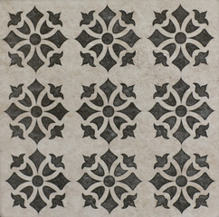 ceramic tile with abstract mosaic floral pattern
