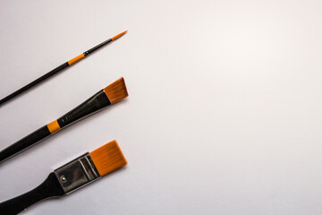 Three Paintbrushes on white background