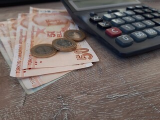 Turkish Lira and Calculator on Desk