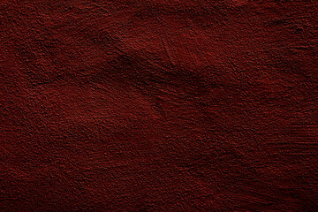 Crimson colored abstract wall background with textures of different shades of crimson