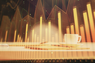 Multi exposure of forex graph drawing and desktop with coffee and items on table background. Concept of financial market trading