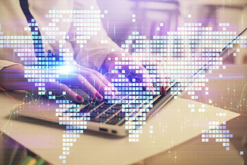 Multi exposure of woman hands typing on computer and business theme hologram drawing. Success...