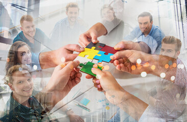 Teamwork of partners. Concept of integration and startup with puzzle pieces