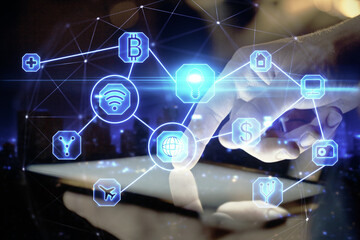 Double exposure of man's hands holding and using a phone and social network theme drawing.