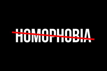Fototapeta premium Stop homophobia. White word hate with a red line on top representing the feeling for people to stop being homophobic.