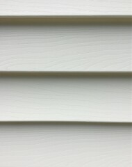 Recently cleaned vinyl siding on a white house