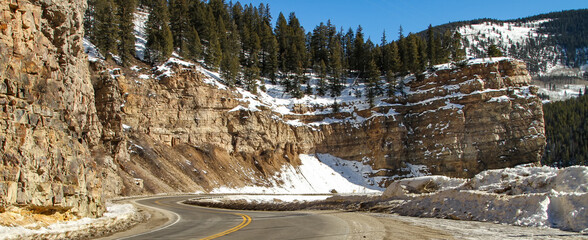 Empty Winding Road In Colorado Mountains