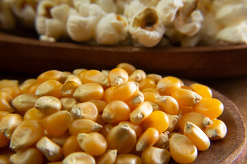 popcorn and corn in the wooden spoon