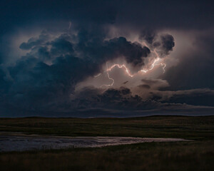 Naklejka na ściany i meble Lightning, Thunder and Severe Weather Over Bodies of Water on the Greta Plains