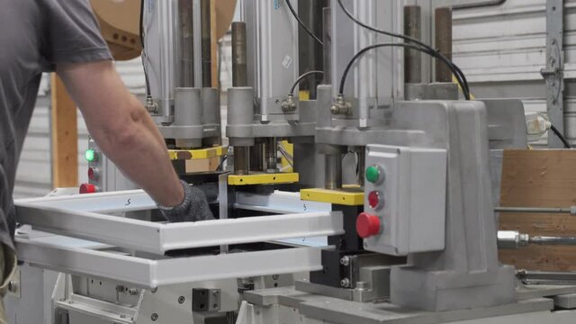 4K. The welding process window of PVC profile. Production technology of PVC Windows. Welding machine for the manufacture of plastic Windows. Production of plastic Windows. Automatic production.