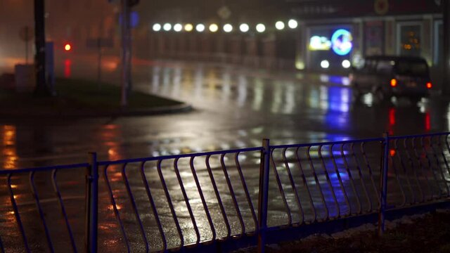 Simferopol empty city streets with street lights at night in autumn.