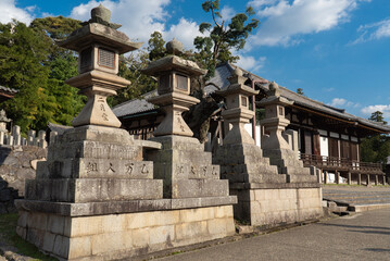 Fototapeta na wymiar Stone lanterns at Nigatsu-do shrine in Nara Park