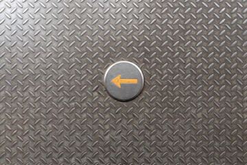 Yellow arrow, iron background