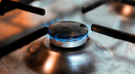 Burning gas on the gas stove