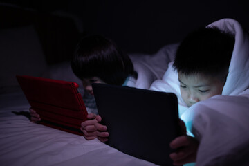 asian chinese boy playing smartphone, kid use phone and play game, addicted game and cartoon
