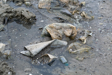 garbage on the beach, dirty sea
