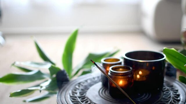 Close Up Of Burning Incense Sticks With Smoke And Candles, Meditation And Health Home Spa