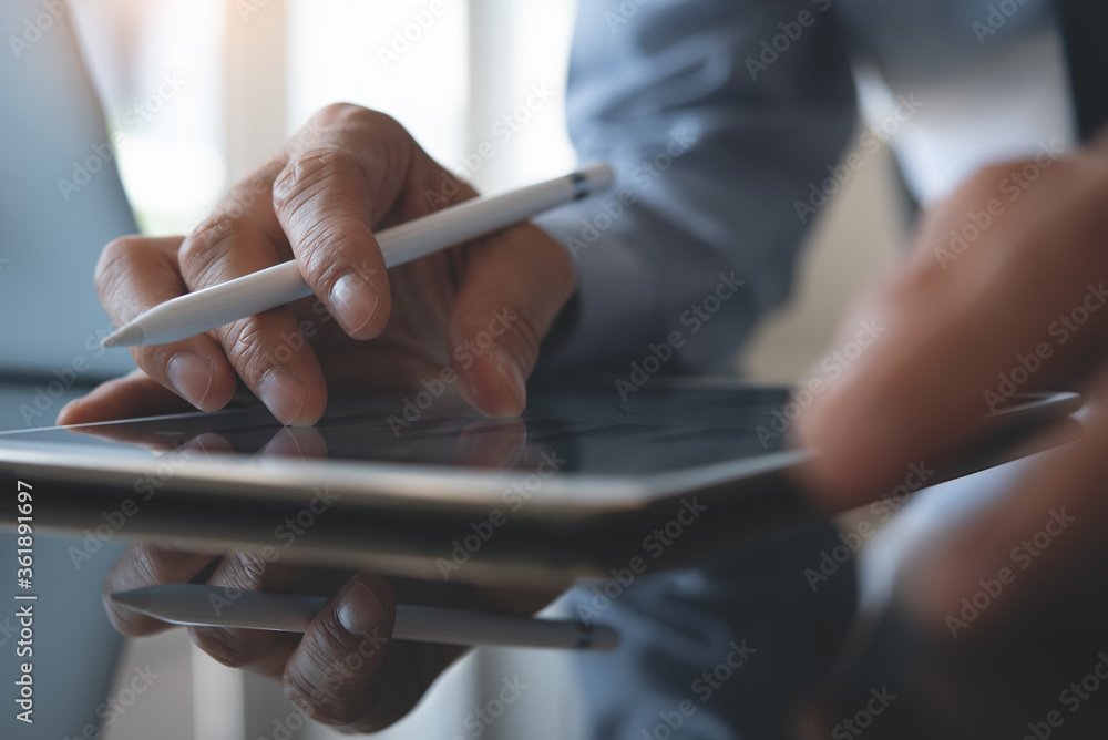 Aufkleber close up of business man using digital tablet computer working in office