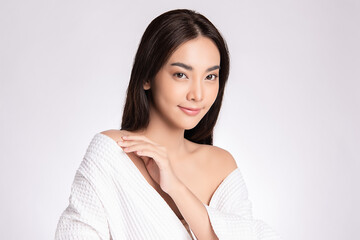 Beautiful Young Asian Woman touching her body with fresh Healthy Skin, isolated on white background, Beauty Cosmetics and Facial treatment Concept.