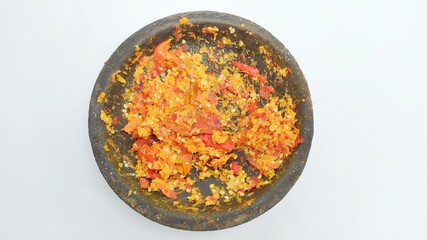 Sambal cobek or Indonesian hot spicy chili sauce isolated on white background