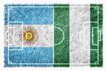 Flags of Argentina and Nigeria on soccer field