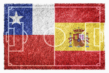 Flags of Chile and Spain on soccer field