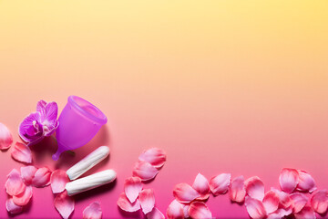 Obraz na płótnie Canvas Feminine hygiene products on bright pink background
