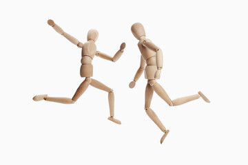 Wooden dummies models playing soccer