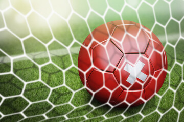 Switzerland soccer ball in goal net