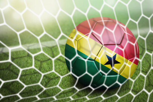 Ghana soccer ball in goal net