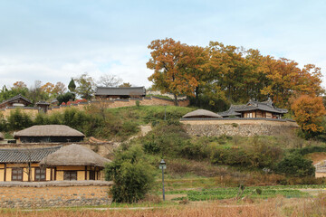 Fototapeta na wymiar Gyeongju Yangdong Folk Village with korean traditional houses and beautiful surrounding in autumn, South Korea