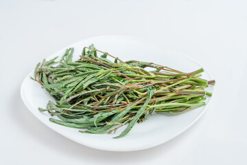 Mimosa vegetables placed on a white background.