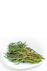 Mimosa vegetables placed on a white background.