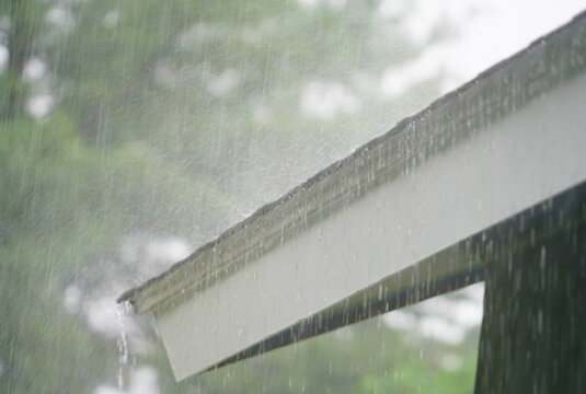 Close Up On Storm Rain On The Roof