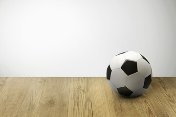 Soccer ball on parquet floor