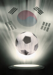 A soccer ball with Korea Republic flag backdrop