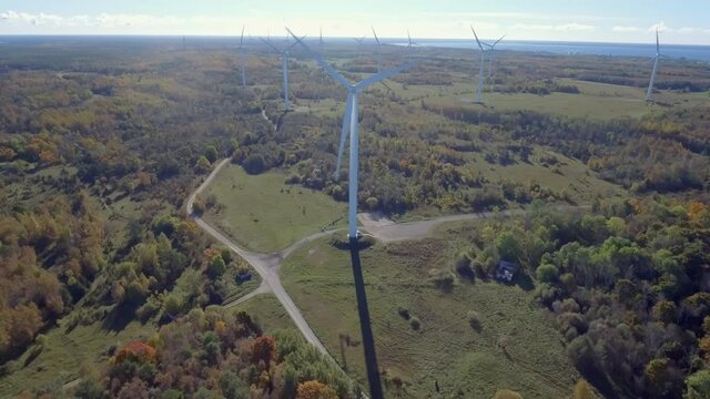 Huge white windmills on the mountain in Parki Estonia.4K