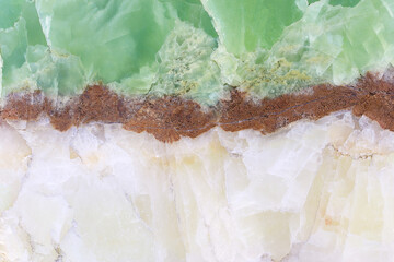 Green and white stratified red stone patterned with natural jade marble stone texture nature layer...