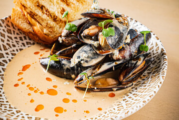 Plate of mussels with creme dubarry in restaurant