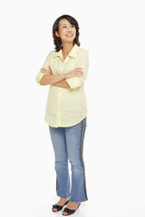 Woman with arms crossed, smiling