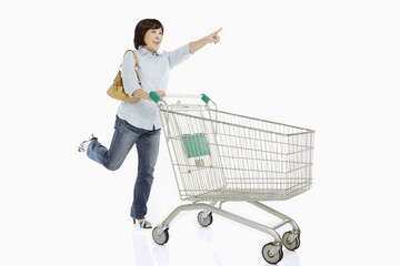 Woman pushing a shopping cart