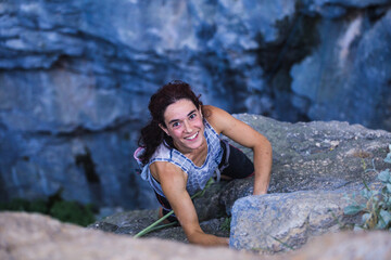 A woman is climbing in Turkey, Turkish woman climbs the rock.