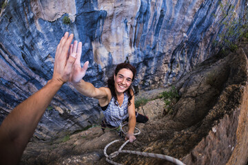 Emotional girl gives five to a friend, A woman is climbing in Turkey, Overcoming the fear of...