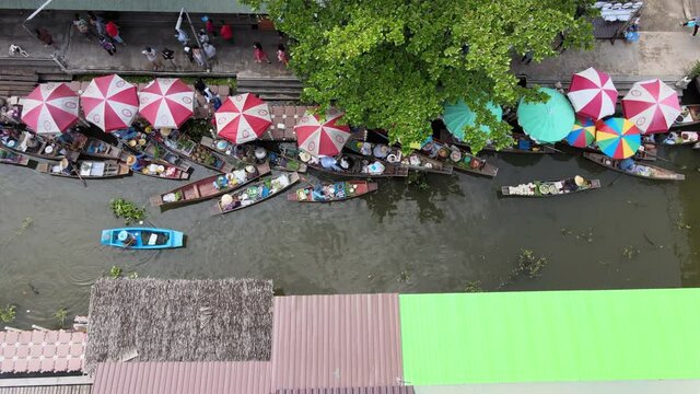 Damnoen Saduak Floating Market is a floating market in Damnoen Saduak District, Ratchaburi Province, about 100 kilometres southwest of Bangkok, Thailand.