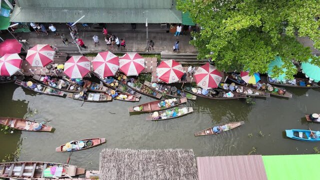 Damnoen Saduak Floating Market is a floating market in Damnoen Saduak District, Ratchaburi Province, about 100 kilometres southwest of Bangkok, Thailand.