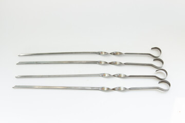 iron skewers on a white background