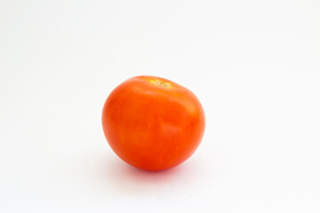 red tomato on a white background