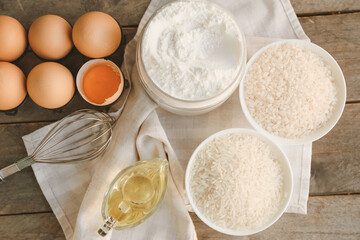 Rice with flour and products on table