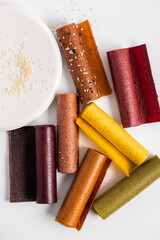 Sweet pure fruit pastille. Natural sweets from berries and fruits. Useful sweets are pastilles, fruit chips. Dietary vitamin nutrition. Vegan food.